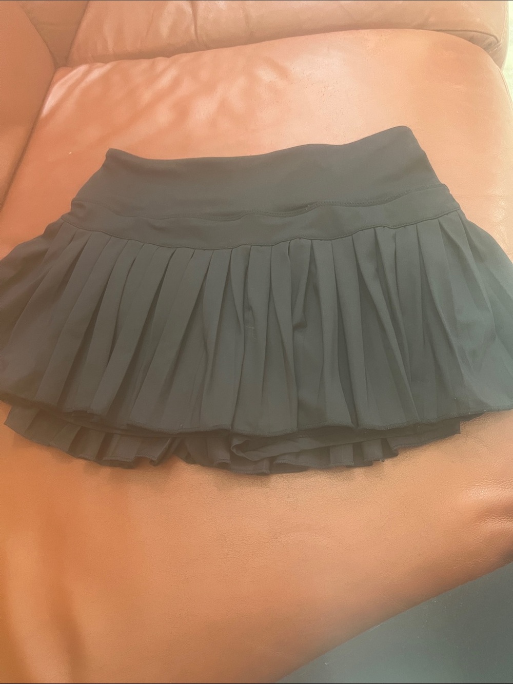 Black Pleated Tennis Mini Skirt by Goldhinge